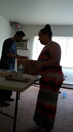 My Brother Donald and my Oldest Daughter Sabrina Getting Stuff ready to Feed The Homeless